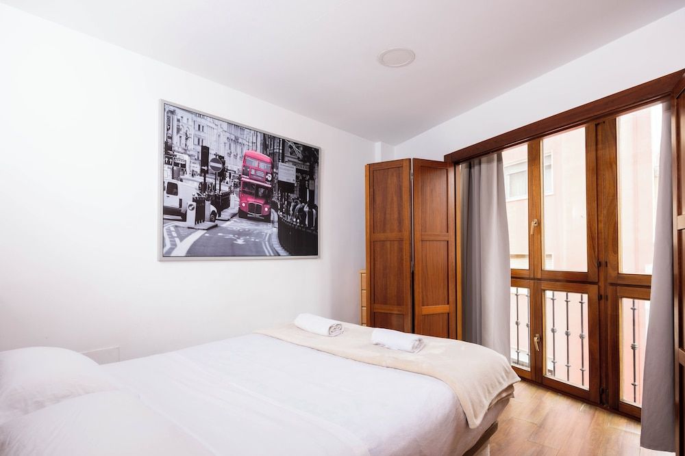 Apartamentos Turísticos Distrito Romano - Room - 1