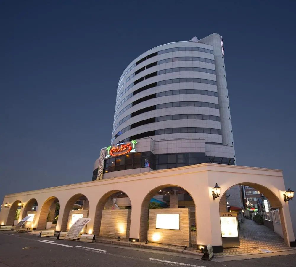 Hotel Alps - Front of property - evening night - 1