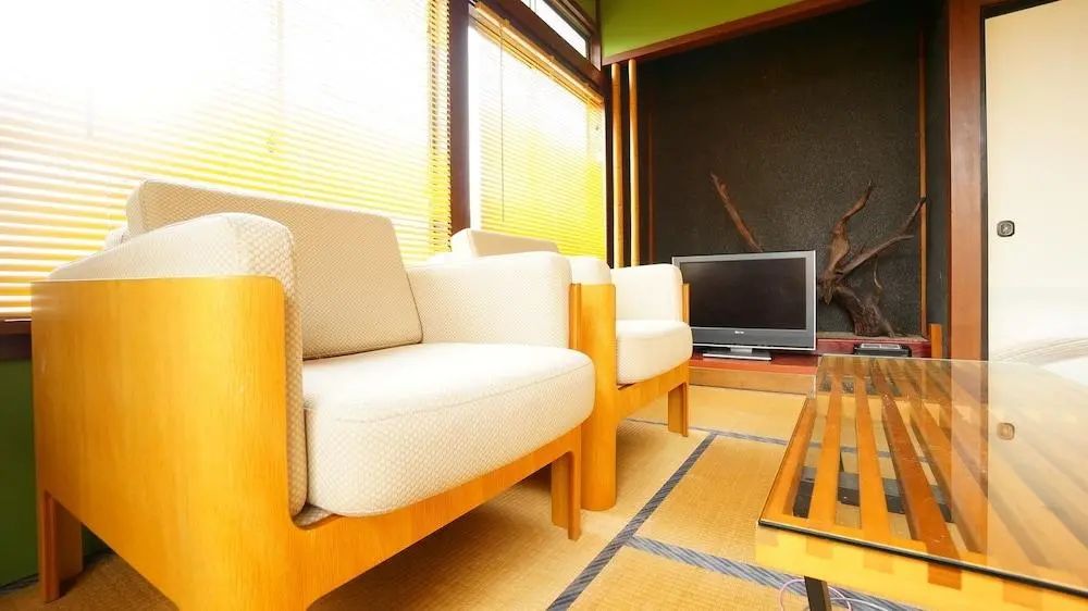 高山超級番茄之家飯店 - Living area - 1