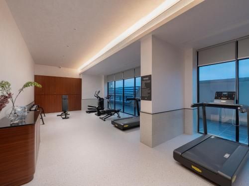 Zhuhai International Convention and Exhibition Center Suisse Place Apartment Hote! - Fitness center - 4