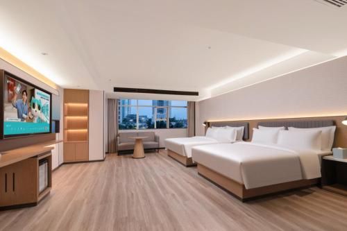 Echarm Hotel Haikou Friendship Sunshine City Wanlvyuan Branch photo 4