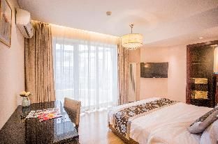 Beijing Guangyao Service Apartments - Bed