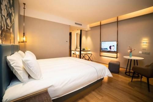Magnotel Huludao Xingcheng Central Square Wenquan Street photo 3