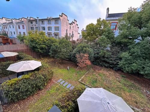 Wuzhen Yinshuxiangshe Design Hotel Xizha Scenic Area South Gate Branch - Balcony/terrace - 4