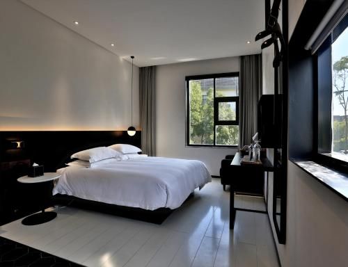 Wuzhen Yinshuxiangshe Design Hotel Xizha Scenic Area South Gate Branch photo 3