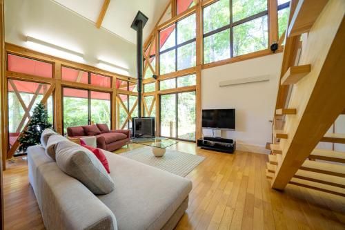 Morino Lodge Chalets - Shared lounge/TV area