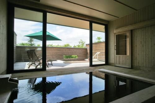 Tokachigawa Onsen Sanyoan - Hot spring bath