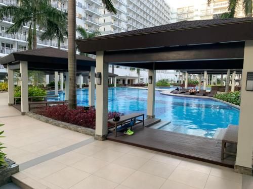 Kathys Crib 11th flr 2 at Shell Residence pool view main photo